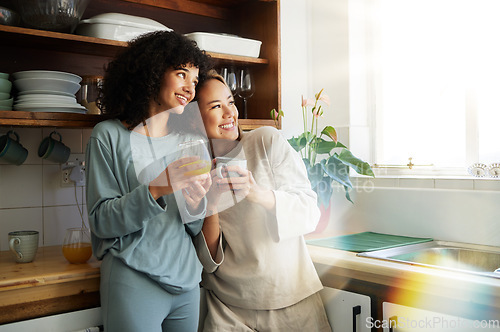 Image of Lgbt couple, coffee and kitchen with smile for connection, romantic or relationship happiness. Lesbian woman partner, apartment and freedom hug for equality conversation, together or diversity pride