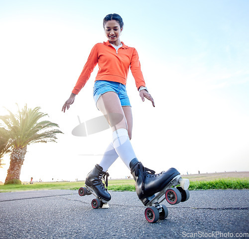 Image of Happy, woman and skating outdoor on sidewalk with wheel, shoes and legs in cardio, exercise or summer workout. Fitness, training and girl roller skate on beach pavement, ground or balance on feet