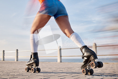 Image of Person, roller skate and fun for summer in closeup for wellness, training or activity for sport. Caucasian, model and fitness on boardwalk, beach and speed for balance, race or competition by alone