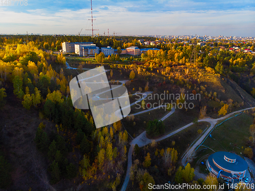 Image of Aerial top vew of winding road in the city