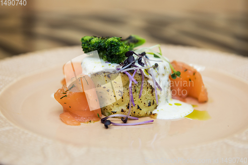 Image of Potato casserole with broccoli and salmon