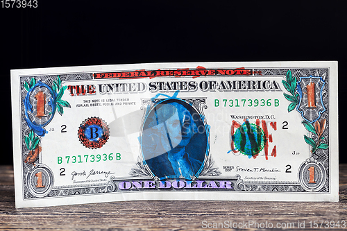 Image of painted one American dollar