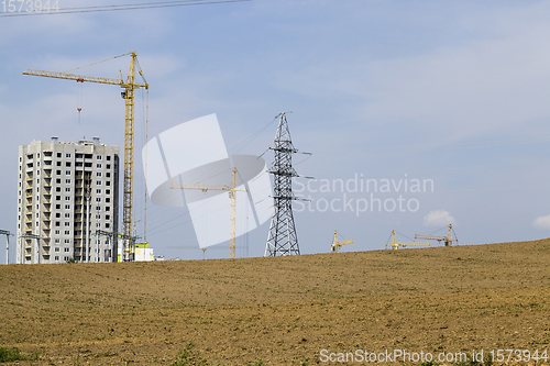 Image of construction cranes