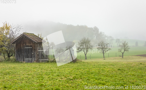 Image of rural scenery with implement shed