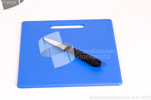 Image of Paring knife on Blue Cutting Board