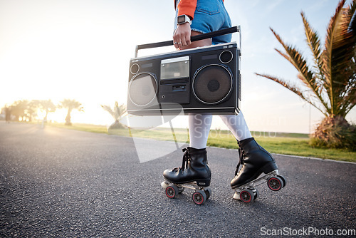 Image of Woman, retro radio and outdoor with roller skates, music and training with freedom, road and summer. Girl, skating and vintage sound system for noise, exercise and workout in sunshine with moving