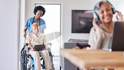 Image of Tablet, wheelchair and assisted living caregiver with a patient in her retirement home for care. Technology, healthcare and black woman nurse helping a senior with a disability for medical support
