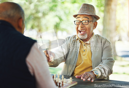 Image of Winning, chess and senior man outdoor or friends in game of strategy in retirement for mental challenge. Boardgame, success and elderly person in park, woods or nature and move king in checkmate