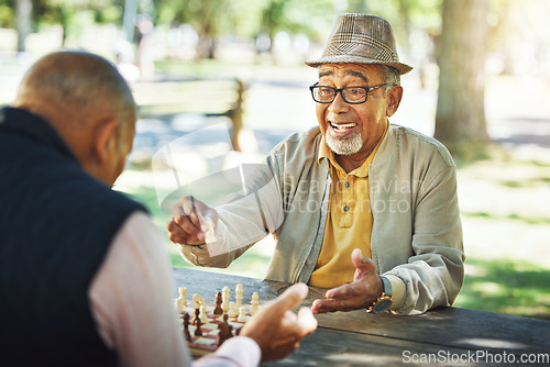 Image of Elderly men in park, chess game and winner of competition or challenge, friends in retirement and happiness. Achievement, success and contest outdoor, moving piece for checkmate and problem solving