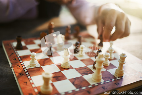 Image of Hands, chess game and board with strategy in competition or challenge, intelligence and closeup of people playing. Thinking, planning and contest outdoor, concentration on boardgame and recreation