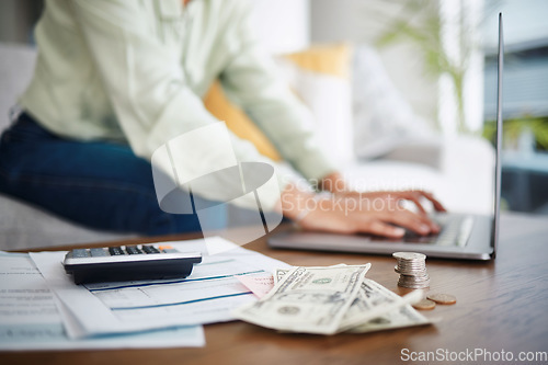 Image of Laptop, money and calculator with hands for home budget, financial planning and salary, rent cost or loan research. Person typing on computer and sofa with cash and documents, mortgage or bills