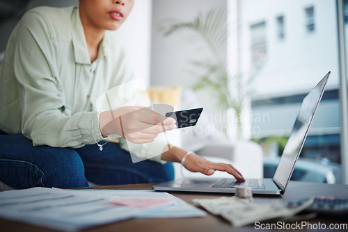 Image of Woman, credit card and bills with laptop, budget and e commerce and fintech, information and internet banking at home. Online shopping, finance and money to pay and savings with customer experience