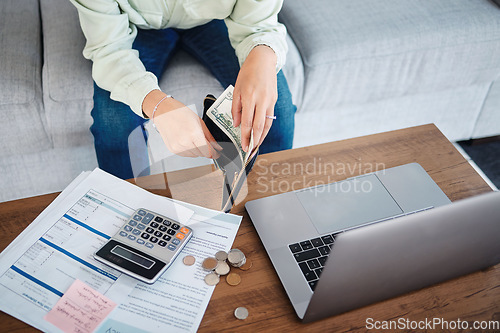 Image of Hands, wallet and money, budget and bills, finance management with laptop and calculator for tax paperwork. Financial plan, person with information on documents and audit with accounting at home