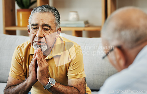 Image of Stressed senior man talking to a psychologist at mental health, psychology and therapy clinic for session. Therapist with clipboard for counseling checklist with elderly male patient in modern office