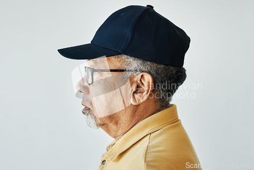 Image of Face, old man and thinking in studio with profile for vision, retirement and ideas on white background. Person, serious and expression for wellness, remember and memory or reflection on old life