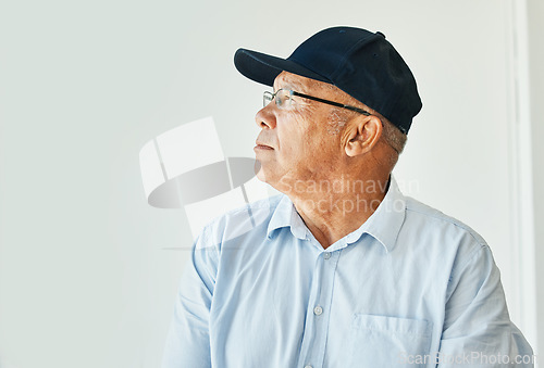 Image of Senior man, retired and thinking in old age home, future or retirement fund for life, healthcare or freedom. Grief, widower or alone with memory, sad or depressed with vision, mental health or worry