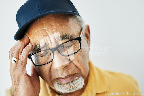 Image of Headache, pain and face of senior man with fatigue, burnout or problem with health on white background. Stress, migraine and frustrated elderly person with hand on head in retirement with anxiety