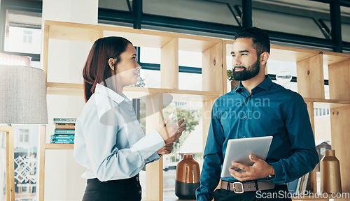 Image of Business people, smile and tablet with communication for meeting, collaboration and partnership in office. Professional, man and woman with touchscreen or discussion for recruitment at workplace