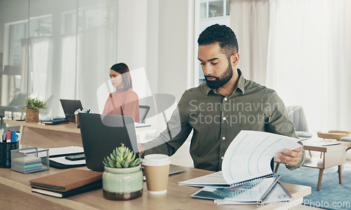 Image of Business man, paperwork and laptop for taxes, finance report and company revenue or budget planning in startup office. Professional worker with accounting documents, computer and audit or bookkeeping