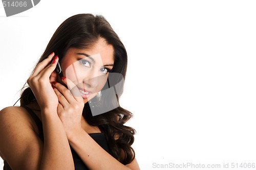 Image of Beautiful girl speaking in telephone, using a headset