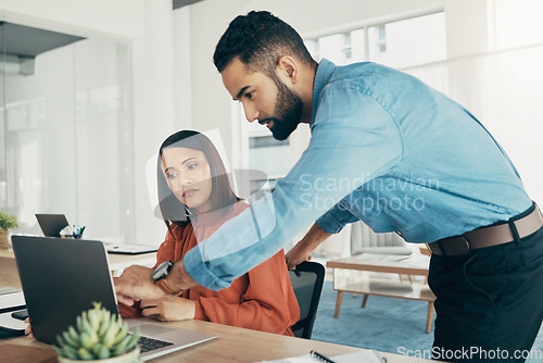 Image of Creative people, coaching and laptop in teamwork, collaboration or planning together at office. Man helping or training woman or staff on computer in project startup, ideas or strategy at workplace