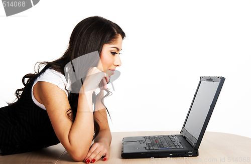 Image of Beautiful girl working on computer