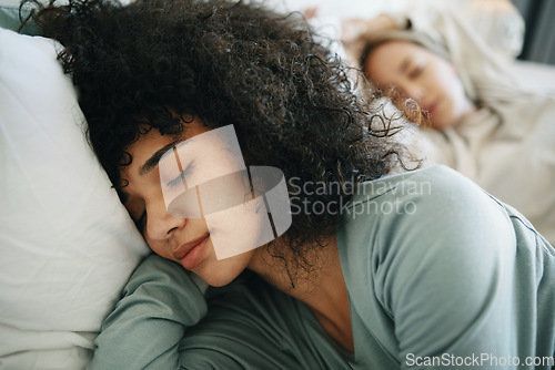 Image of Lgbtq, relax and women sleeping on bed in bedroom with fatigue and love, dream or tired. Exhausted, people and lesbian couple together in home lying on pillow in apartment for wellness and calm