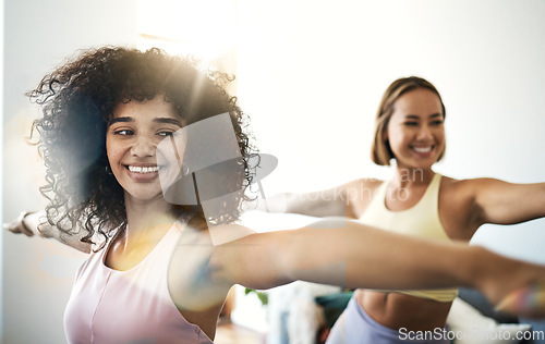 Image of Women, fitness friends with stretching and yoga, happy at home with bonding and training together. Pilates, wellness and lens flare with exercise or workout, yogi team smile with self care and body