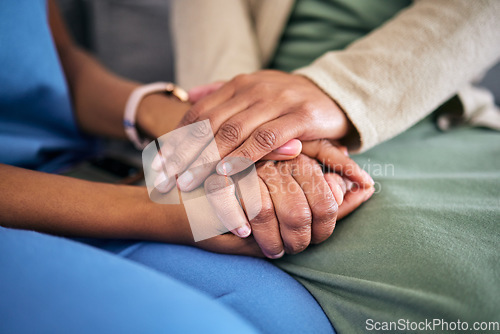 Image of Hands, empathy and helping with life crisis, caregiver with patient for support and grief counseling. People sitting together, healthcare and wellness with advice, kindness and respect with trust