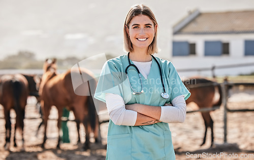 Image of Happy horse vet, portrait and woman with arms crossed, care or smile for love, animal or nature at farm. Doctor, nurse and equine healthcare expert in sunshine, countryside and services for wellness