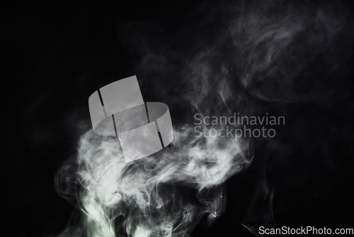 Image of Smoke, vape and pattern on black background with creative texture, mockup and abstract art of gas or cloud design. Smoking, cigarette or fog for air pollution, warning or danger in empty dark studio