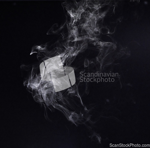 Image of Steam, fog or gas in a studio with dark background by mockup space for magic effect with abstract. Incense, smoke or vapor mist moving in air for cloud smog pattern by black backdrop with mock up.