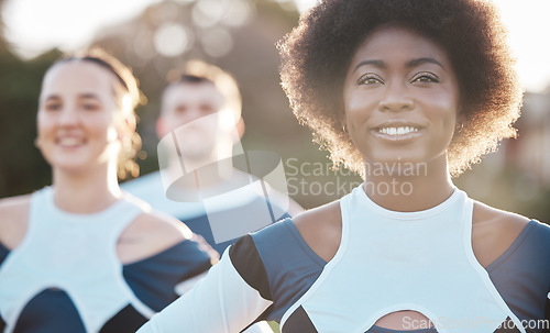 Image of Smile, fitness and a cheerleader group outdoor together for support, motivation or competition in summer. Face, health and wellness with a sports team at an event in a park or on a field of grass