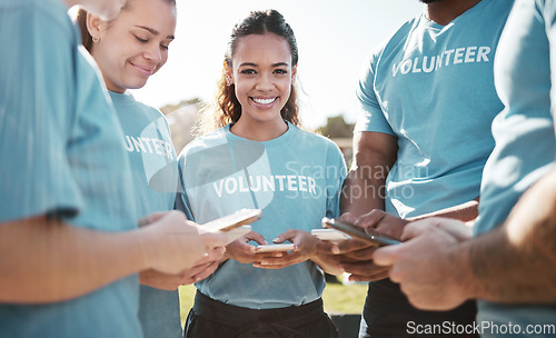 Image of Volunteer, group and portrait of woman with phone for blog, online chat and charity website update. Community service, teamwork and happy on smartphone outdoor for cleaning or recycle on social media