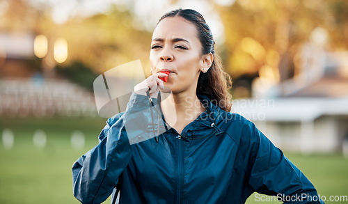 Image of Coach, sports and woman blowing whistle on field for training, planning and challenge for games. Coaching, manager and personal trainer outdoor for exercise, workout schedule and fitness routine