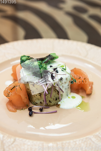 Image of Potato casserole with broccoli and salmon