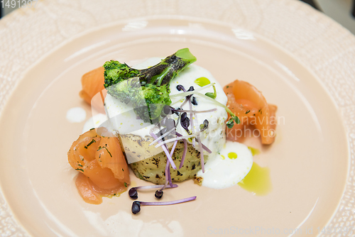 Image of Potato casserole with broccoli and salmon