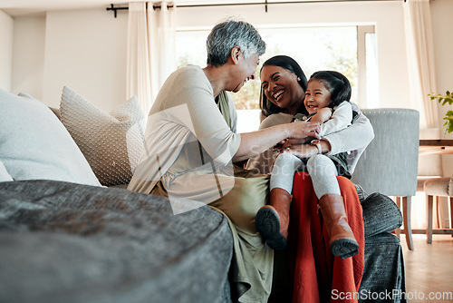 Image of Happy, playful and family on sofa for a visit, conversation and bonding in a house. Smile, living room and a senior person, mother and girl kid for love, care and communication together on the couch