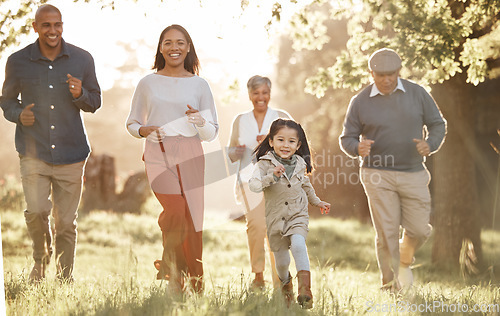 Image of Family, running and parents or grandparents with girl child in park for freedom, adventure or playing in summer. Love, men or women with fun on grass field or forest in sunshine for care or happiness