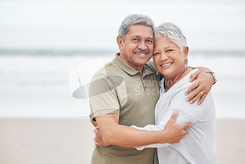 Image of Senior couple, portrait and hug at beach for holiday, vacation or tropical travel in retirement with mockup. Happy man, elderly woman and embrace to relax at ocean, love or loyalty to support partner