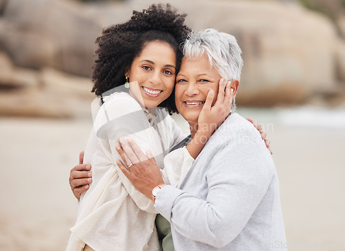 Image of Portrait, love and woman with senior mother at beach happy, care and hug in nature together. Family, face and female person with elderly mom at the ocean with support, gratitude and trust at the sea