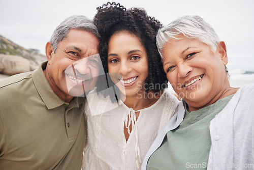 Image of Portrait, happy woman and elderly parents at beach on holiday, vacation or travel outdoor. Face, adult daughter and mother and father bonding together at ocean for family connection, love and support