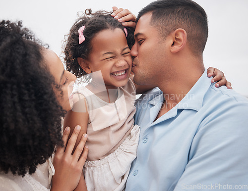 Image of Family, beach and mother with father, girl and vacation with sunshine, bonding and weekend break. Parents, mama and dad with embrace, kid or child outdoor with happiness, seaside holiday and cheerful