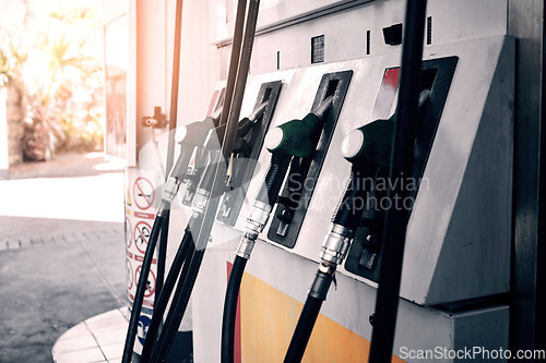 Image of Pump at gas station for service, fuel and transport cost for energy, drive and quality petrol economy. Travel, gasoline price increase and garage to refuel tank with diesel product for road trip.