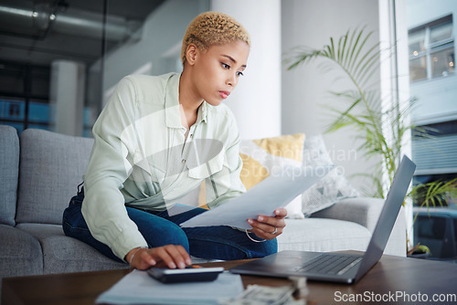 Image of Finance, calculator and woman with a laptop, document or bills with budget planning, home and inflation. Person, paperwork or girl on a sofa, pc or review financial profile with tax and economy