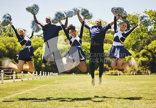 Image of Cheerleader team portrait, people and jump for performance on field outdoor in training, celebration or exercise. Happy, cheerleading group and energy for support at event, sport competition and blur