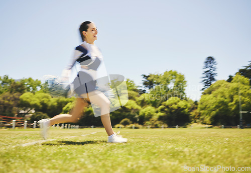 Image of Fitness, cheerleader and woman running on a field for match motivation, energy or performance. Sports, runner and cheerleading female with freedom at a park for game training, practice or competition