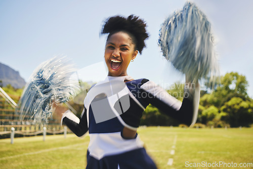 Image of Woman, cheerleader and smile with pompoms on field, fitness and training for performance, trick and dance. Energetic black person, cheer and sports for motivation, support and encourage in uniform