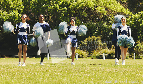 Image of Motion blur, motivation and a cheerleader group of young people outdoor for a training routine or sports event. Smile, teamwork and diversity with a happy cheer squad on a field together for support