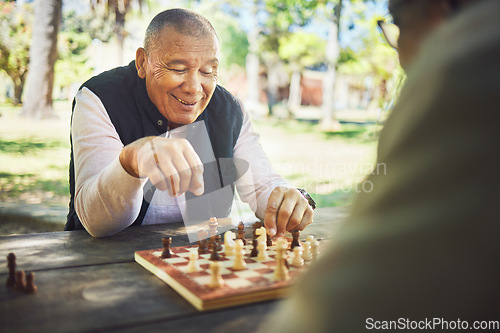 Image of Happy, table and people in nature for chess, strategy and relax with a sport together. Smile, thinking and elderly or senior friends in retirement with games in a park on a board for competition